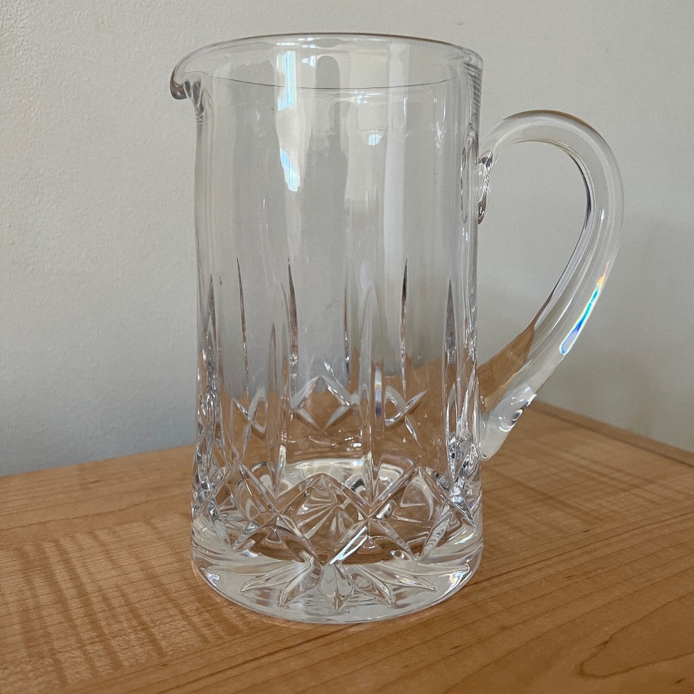 Lead Crystal Water Pitcher.  Etched Design.  H 7" W 3 1/2".  Good Condition